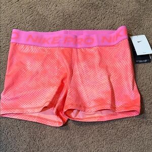 Nike Women's Vibrant Pink Athletic Shorts Size XL  NWT. Check out matching Bra